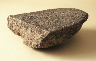 Část kamenného drtidla